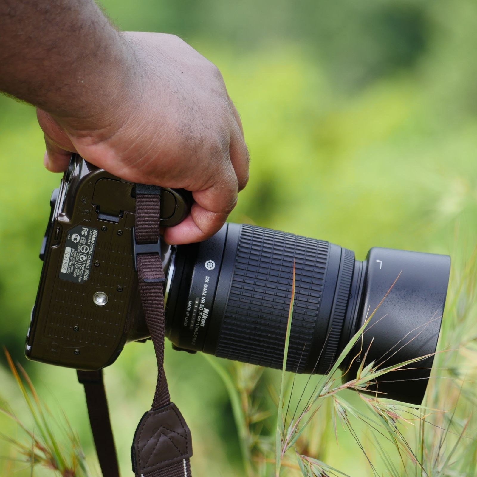 Editor framing a shot with a camera on location